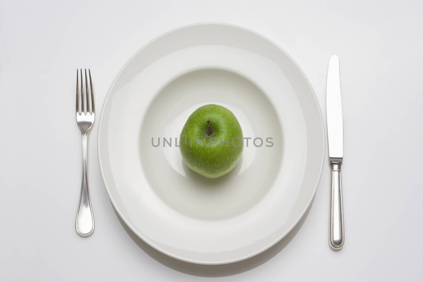 apple -diet food on a plate by courtyardpix