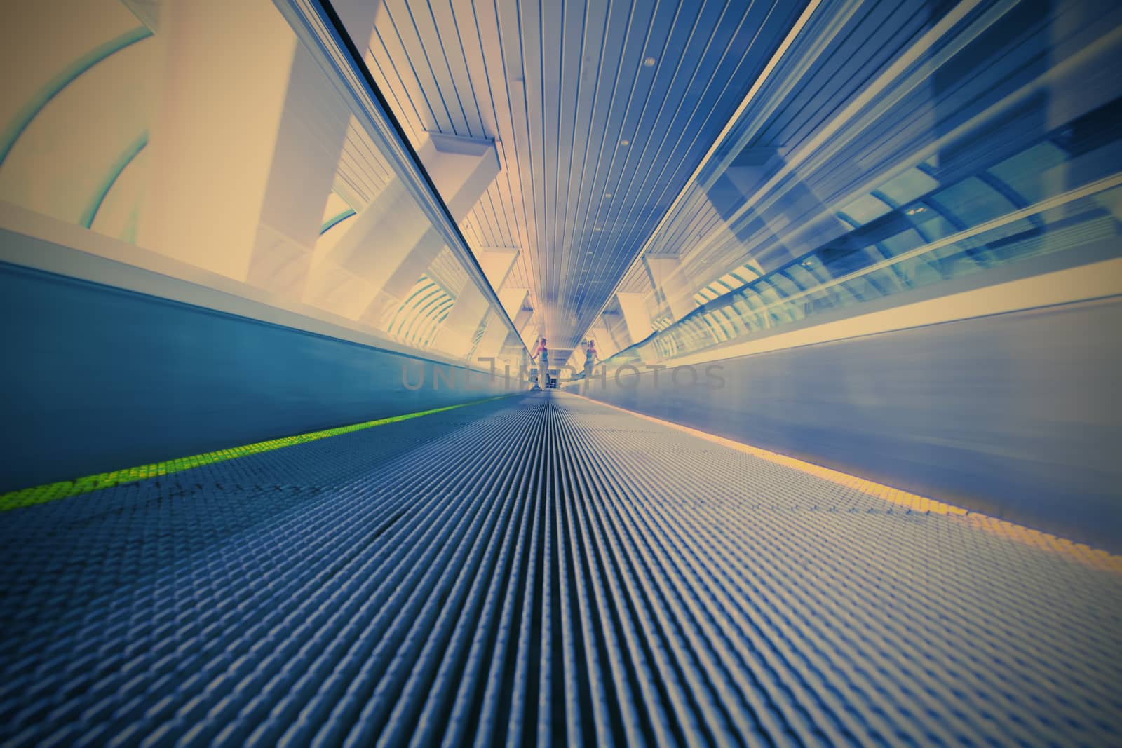 blue moving escalator in the office center, instagram image style