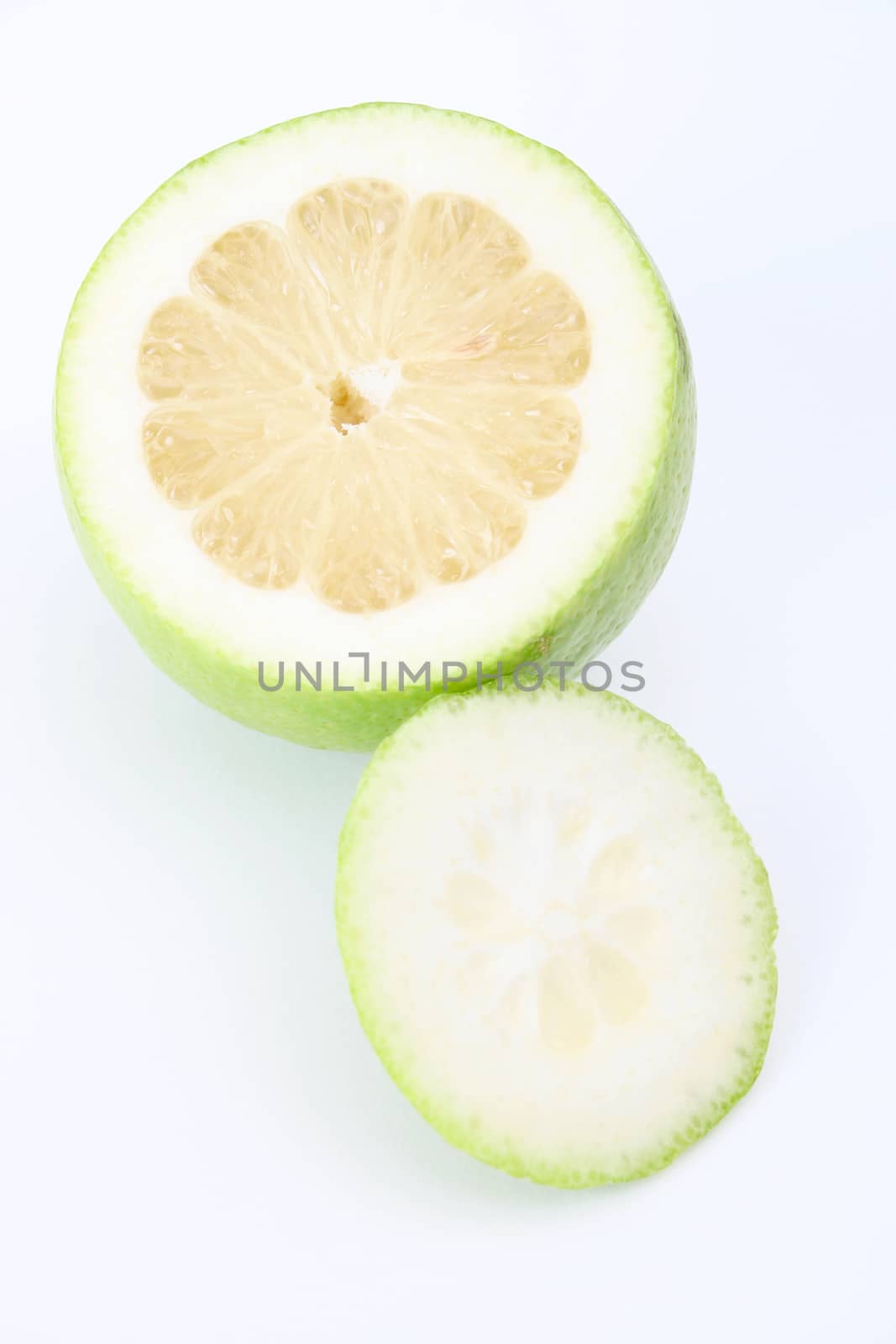 Sliced green lime on a white background