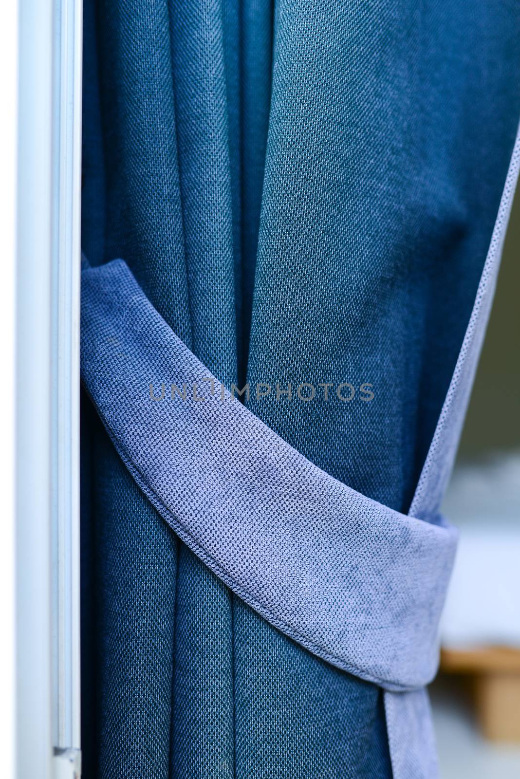 blue curtain with garter