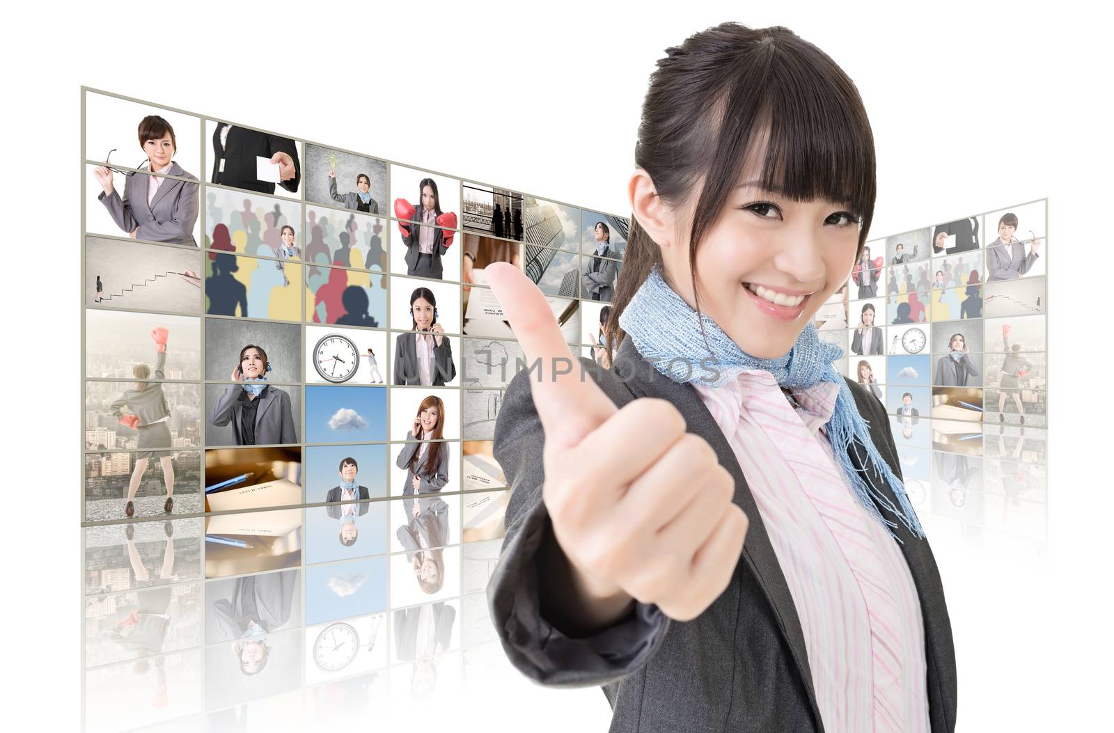 Confident Asian business woman give you a excellent sign standing in front of TV screen wall, closeup portrait.
