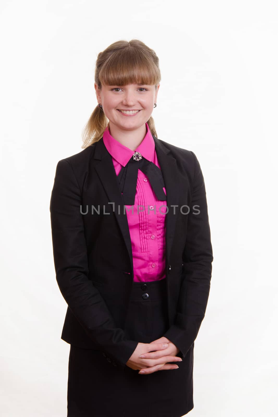 Portrait of a young girl in a suit