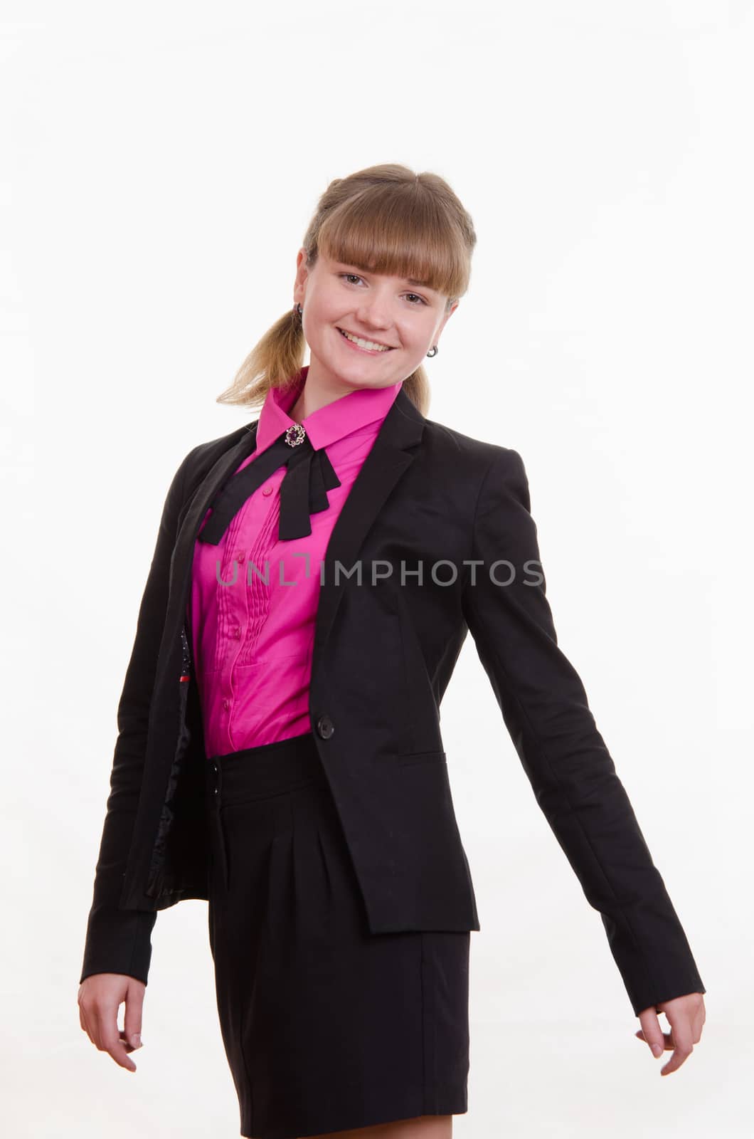 Portrait of a young girl in a suit