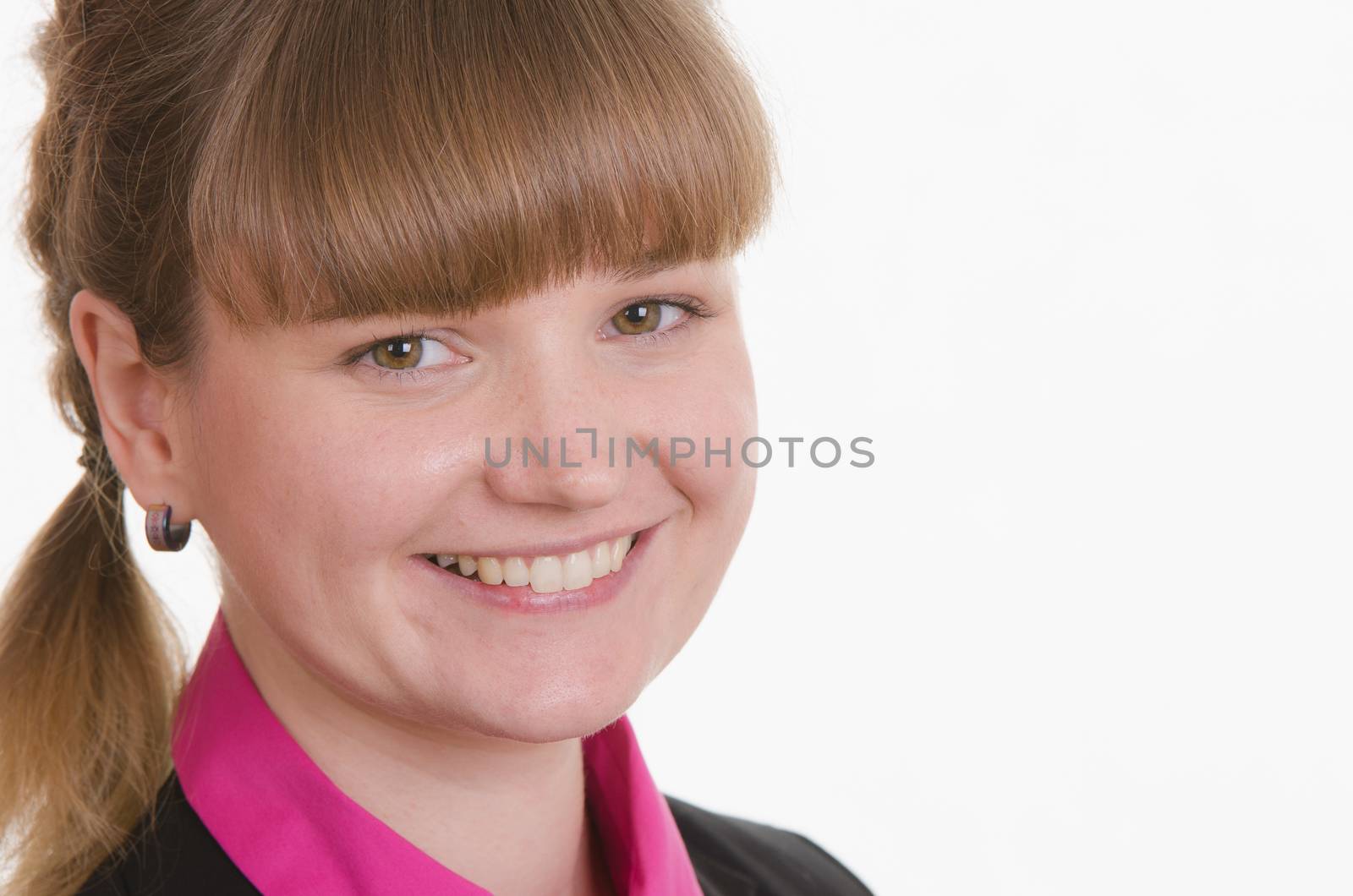 Portrait of a young girl in a suit