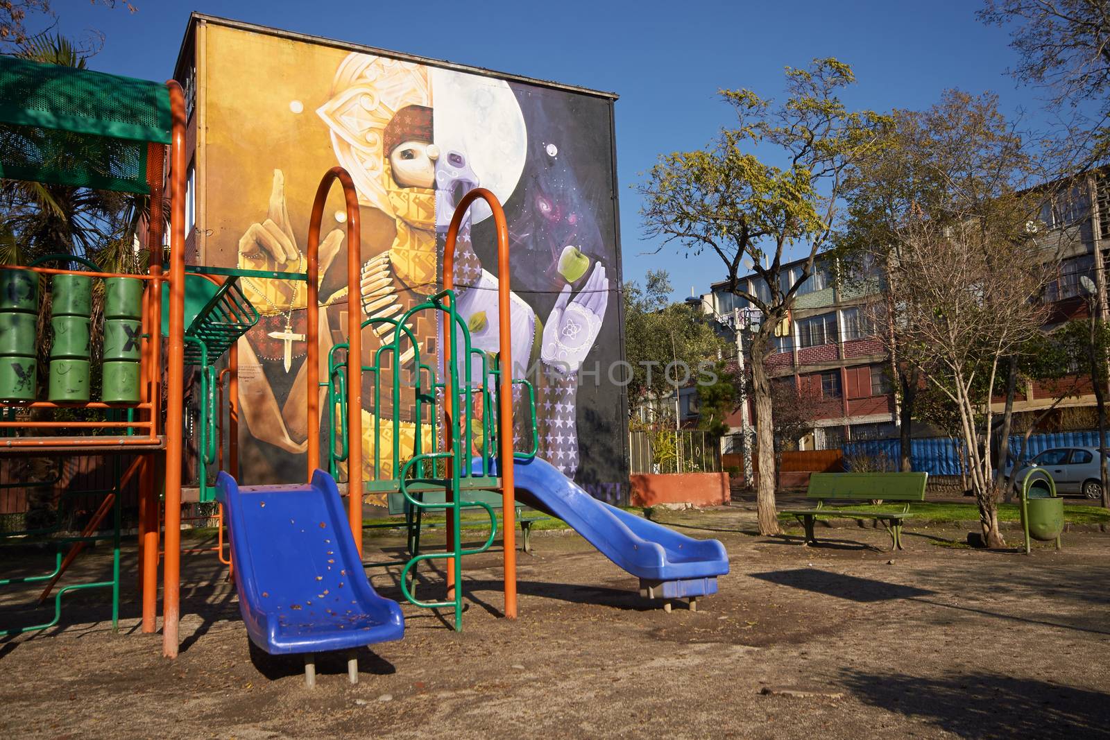 Colourful murals adorning the walls of tenement blocks in the San Miguel area of Santiago, capital of Chile. The area was created as an open air museum in what was a run down area of the city.