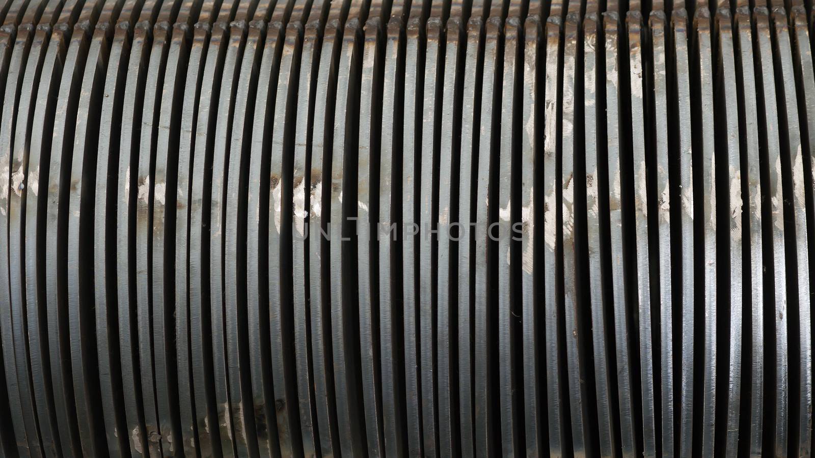 Close-up of steel parts for screw conveyors at an early production stage.