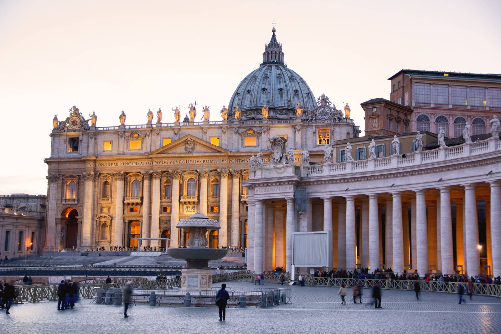 Saint Peter's Square in Vatican City (Rome, Italy) at dusk