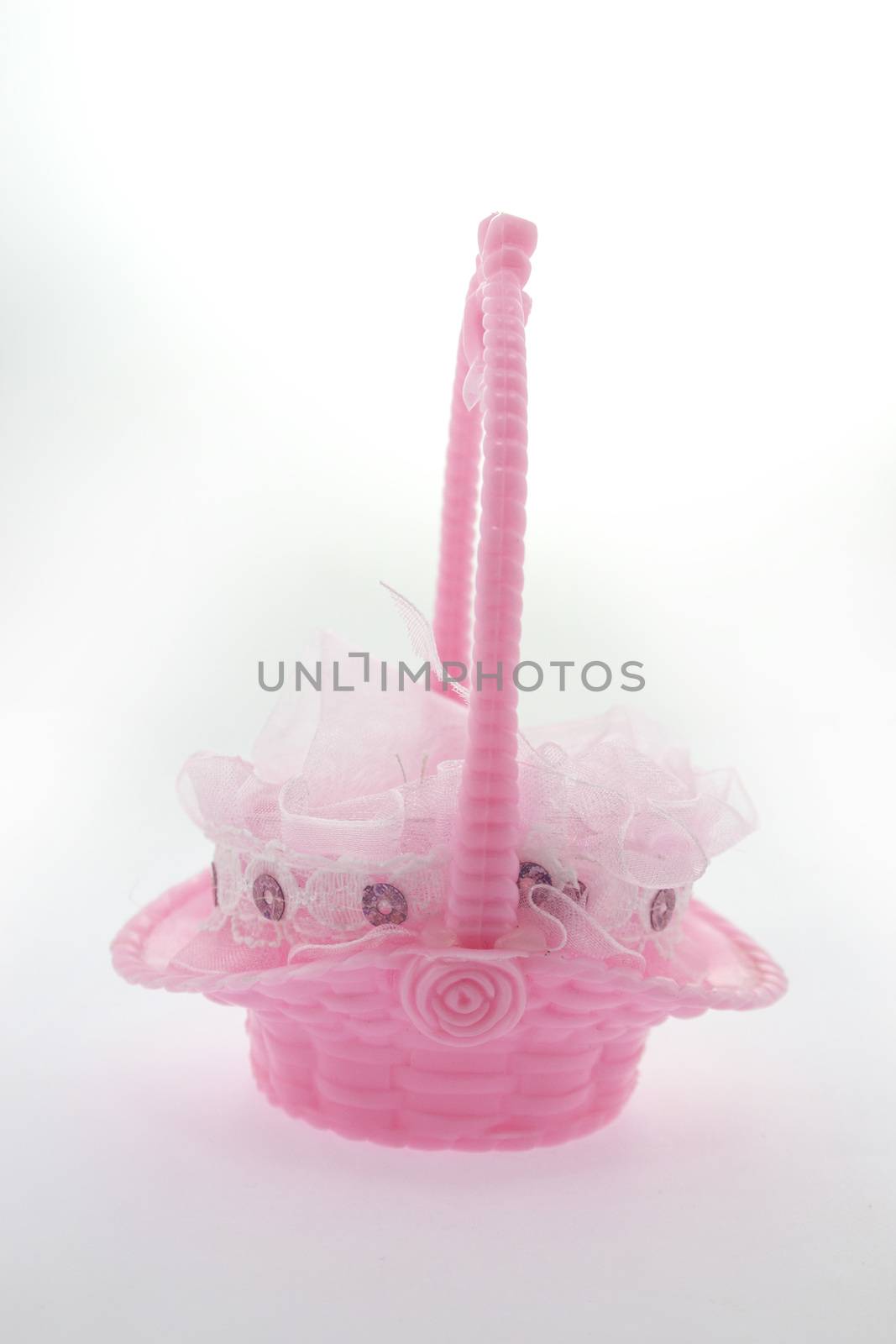 baby girl souvenir�� Small pink plastic basket for candy.
