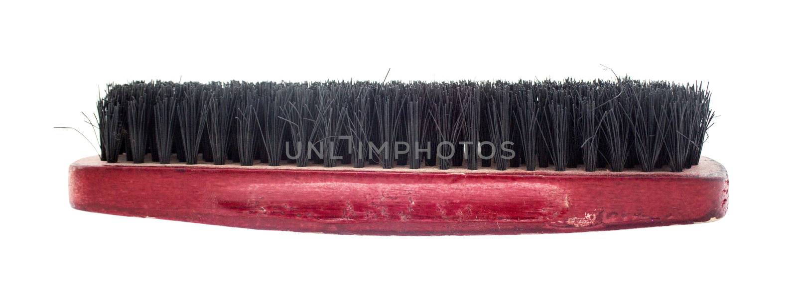Wooden brush isolated on the white background