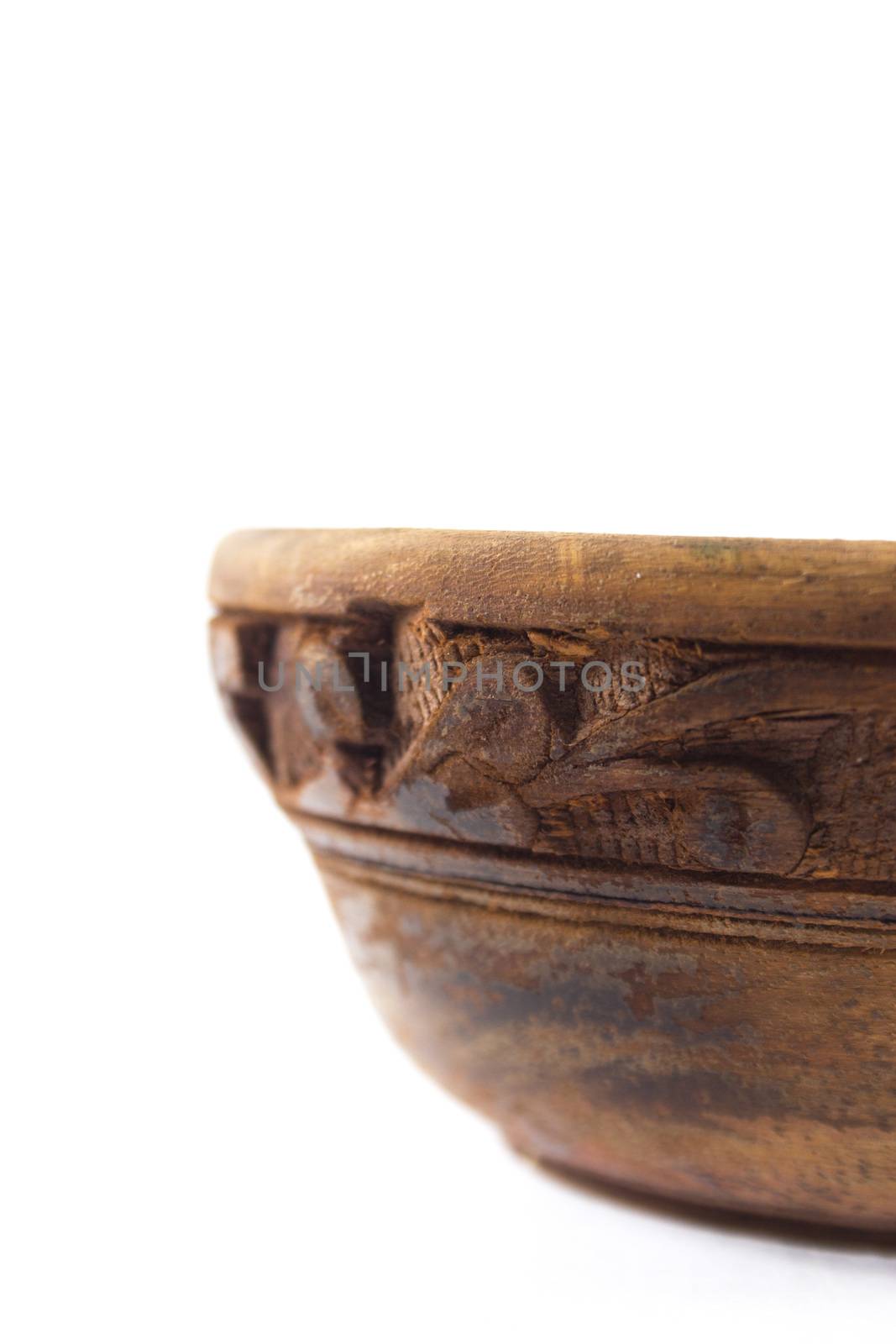 Empty wooden bowl on a white background.