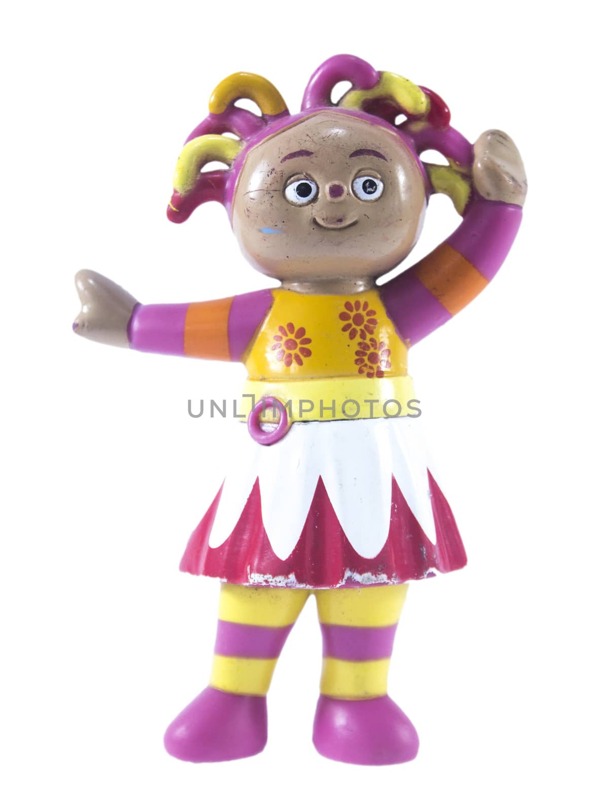 Beautiful girl doll clown on a white background