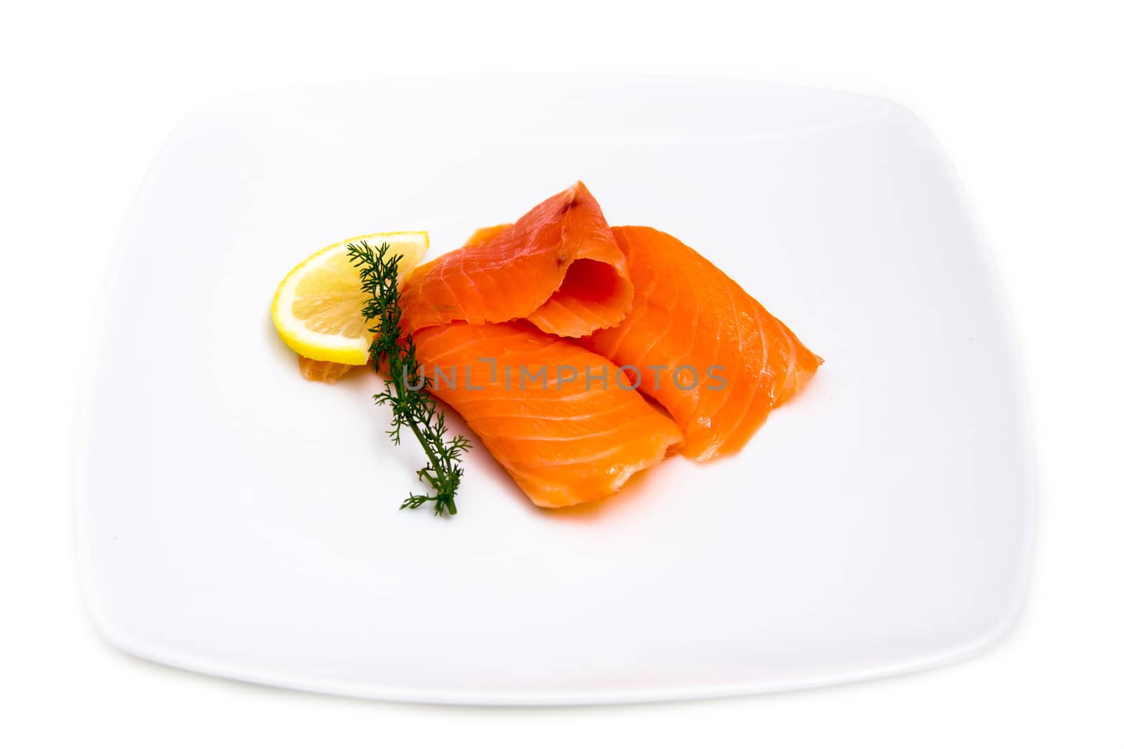 Smoked salmon on plate on white background