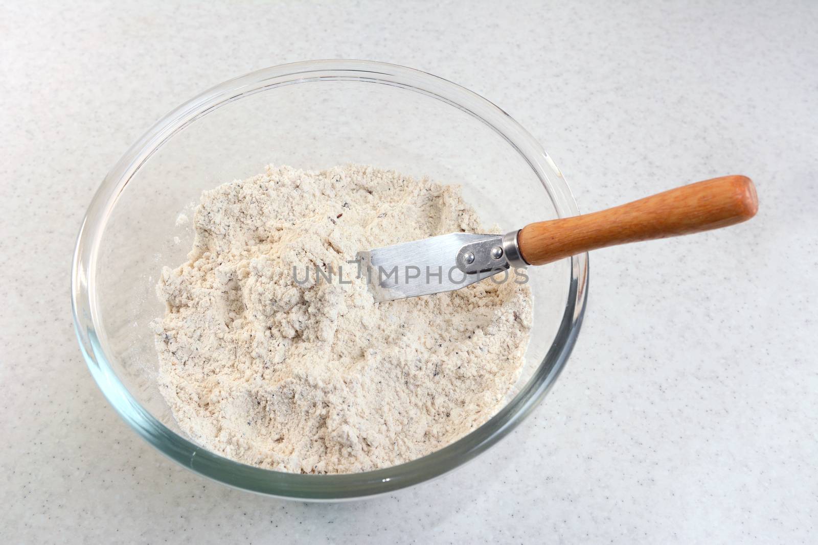 Mixing bread flour mix and rubbed in butter with a palette knife