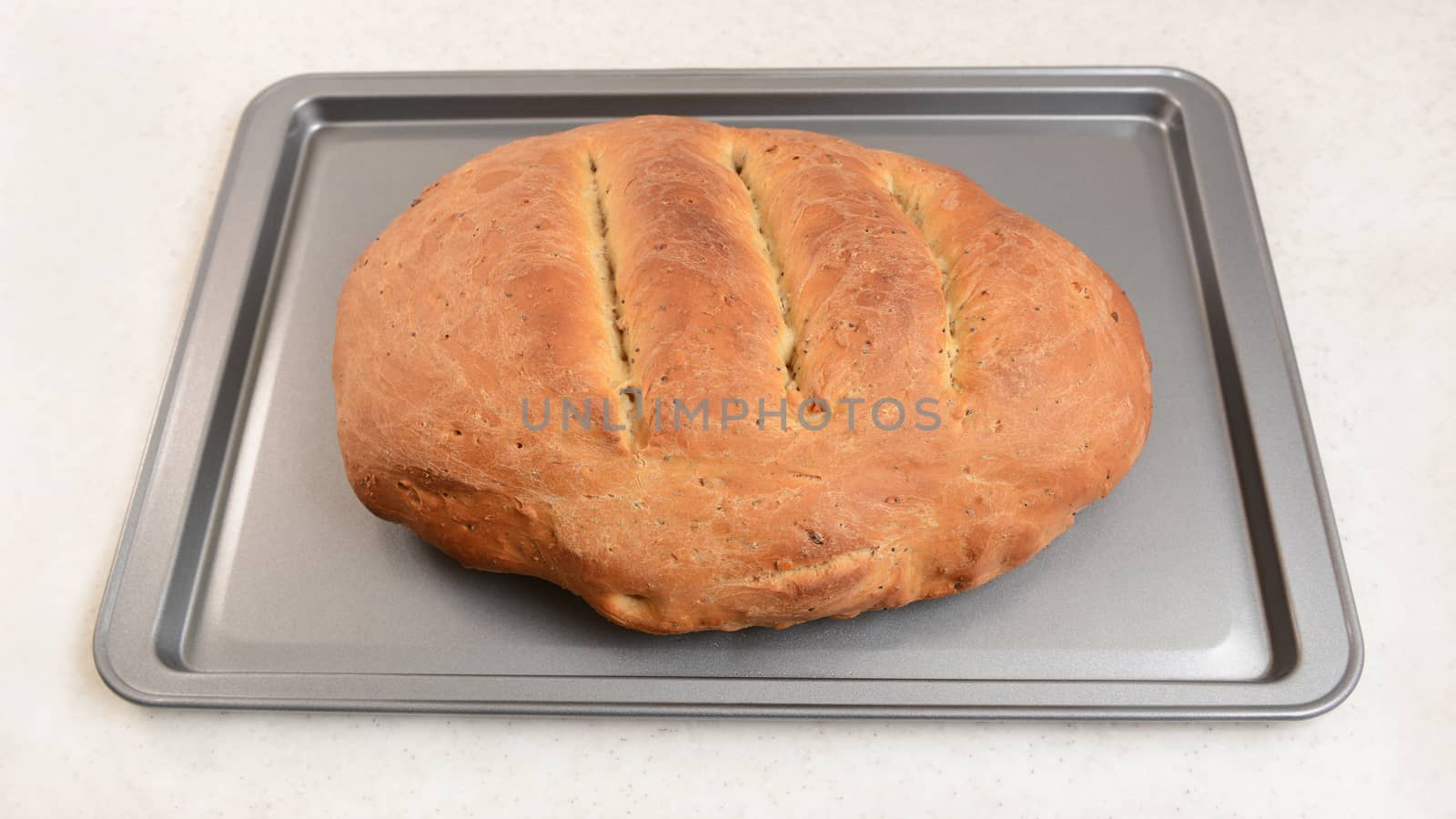 Freshly-baked multi seed malted bread, hot from the oven
