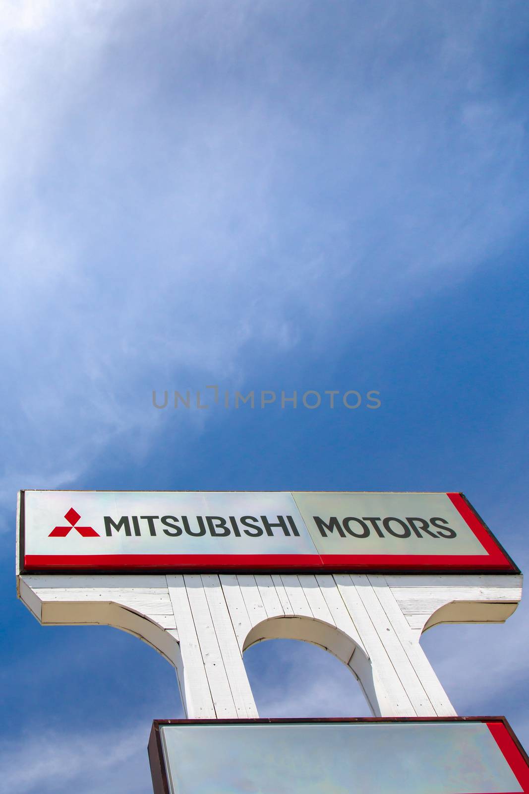 SAN JOSE,CA/USA - MAY 24, 2014: Mitsubishi Motors Autombile Dealership Sign. Mitsubishi is a Japanese manufacturer of automobiles and commercial vehicles.