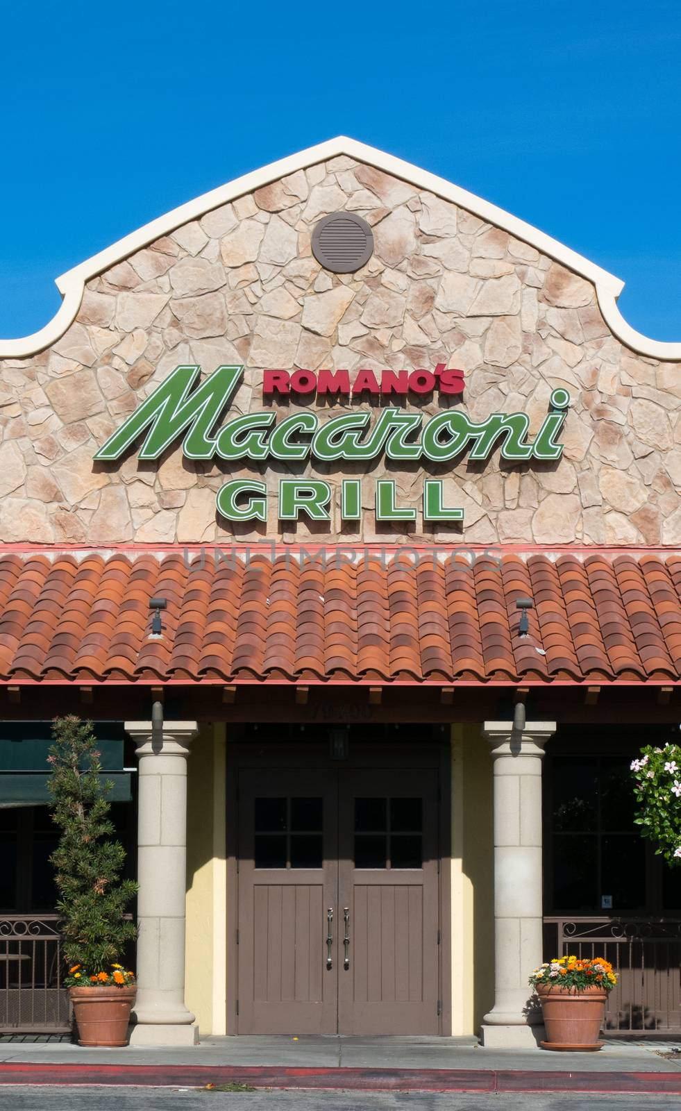NORTHRIDGE, CA/USA - NOVEMBER 24, 2014: Romano's Macaroni Grill exterior. Romano's Macaroni Grill is a casual dining restaurant chain specializing in Italian-American cuisine.