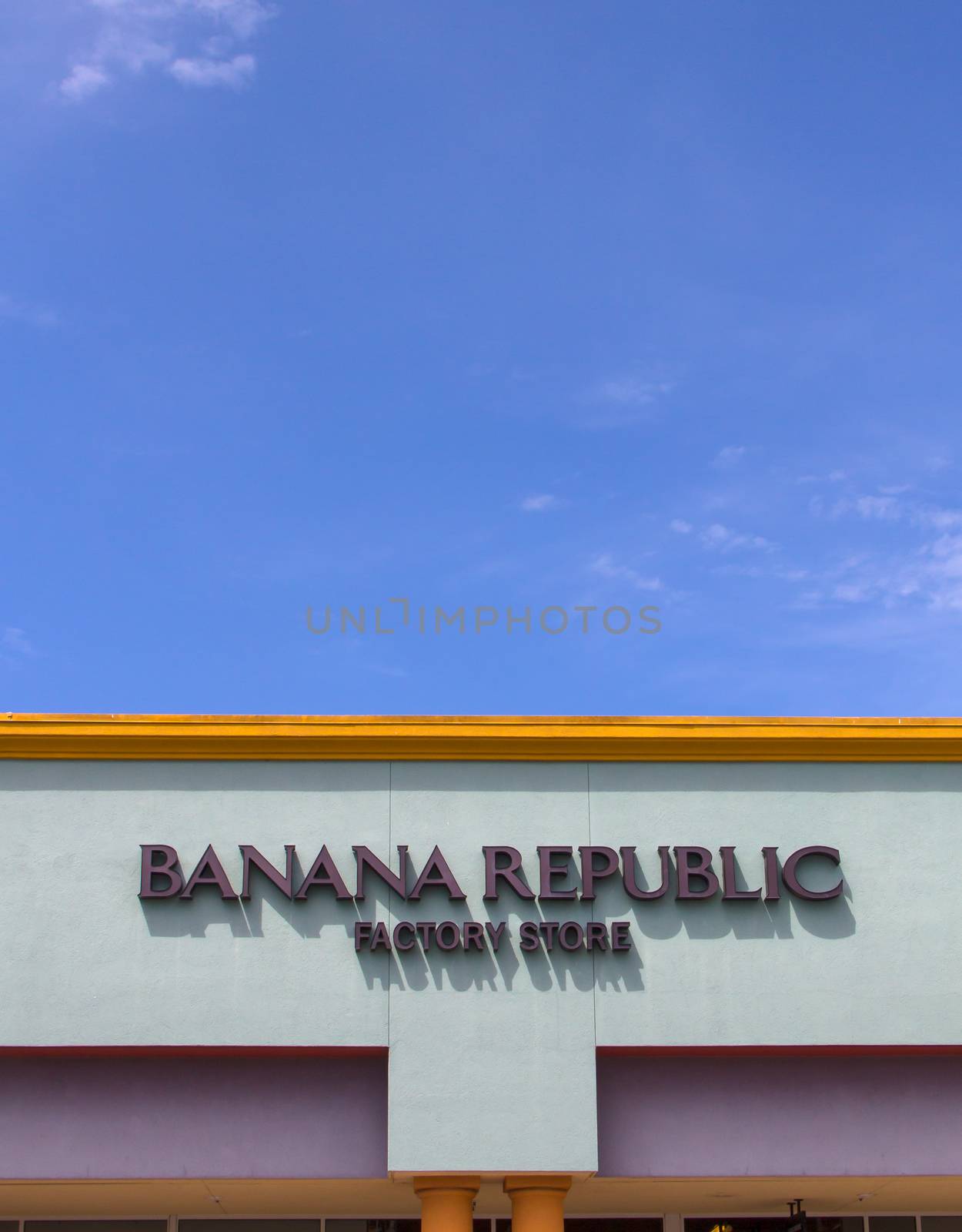 GILROY, CA/USA - JULY 19, 2014: Banana Republic store exterior. Banana Republic is a clothing and accessories retailer owned by American multinational corporation Gap Inc.