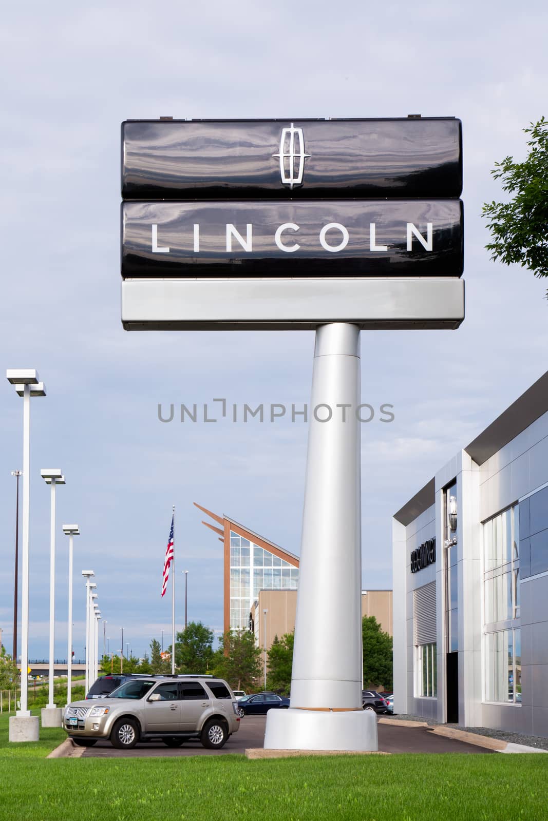 BLOOMINGTON, MN/USA - JUNE 22, 2014: Lincoln automobile dealership exterior. Lincoln is a division of the Ford Motor Company that sells luxury vehicles under the Lincoln brand.