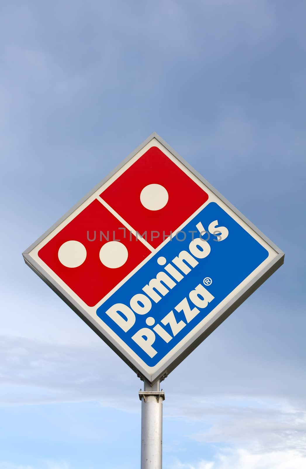 EAU CLAIRE, WI/USA - JUNE 24, 2014:  Domino's Pizza restaurant sign. Domino's is the second-largest pizza chain in the United States and the largest worldwide.