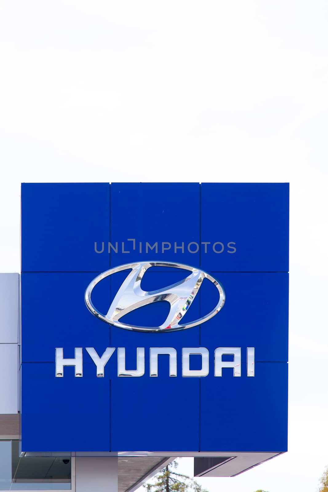 SAN JOSE, CA/USA - MAY 24, 2014: Hyundai automobile dealership sign. Hyundai is a South Korean multinational automotive manufacturer headquartered in Seoul, South Korea.