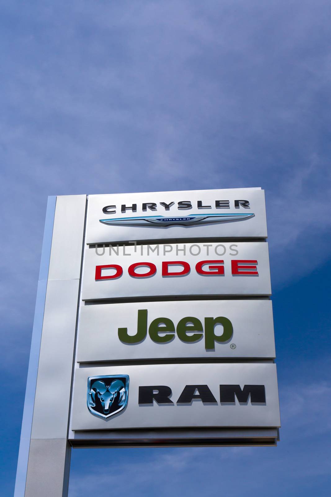 SAN JOSE,CA/USA - MAY 24, 2014: Chrysler, Dodge, Jeep and Ram automobile dealership sign. All are part of the Chrysler Motor Company, an American automobile manufacturer.