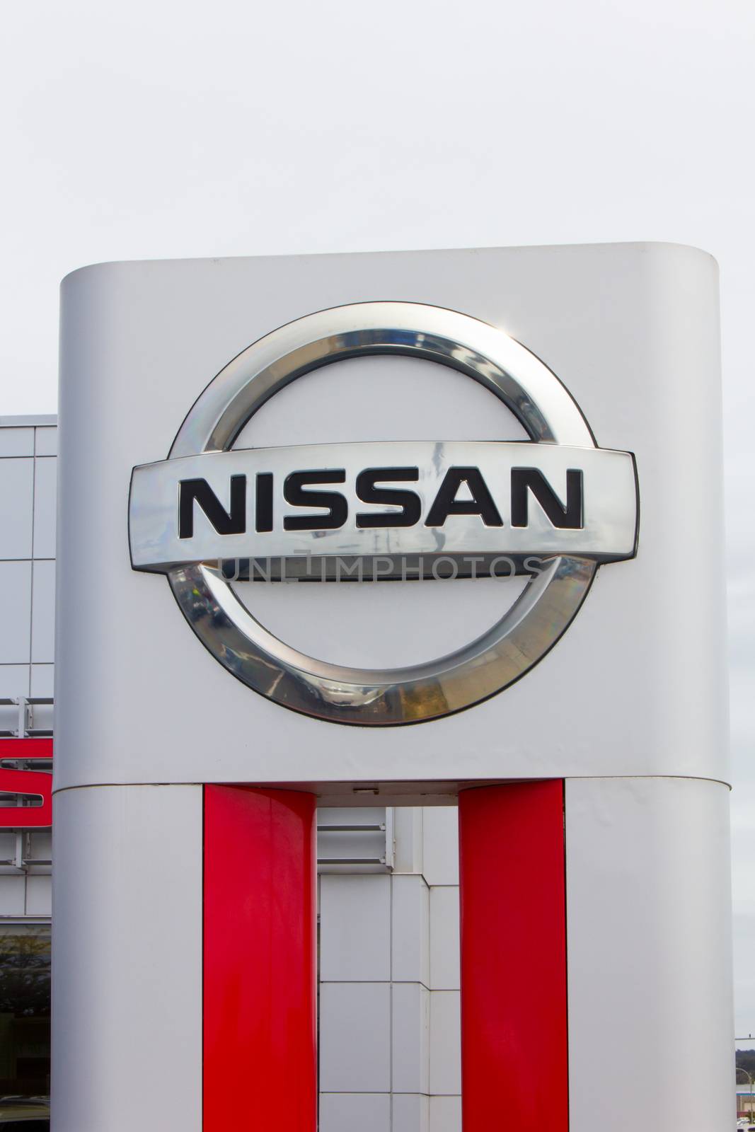 MONTEREY, CA/USA - MAY 8, 2014:  Nissan Motors automobile dealership and sign.  Nissan Motors is is a Japanese multinational automotive manufacturer headquartered in Japan.