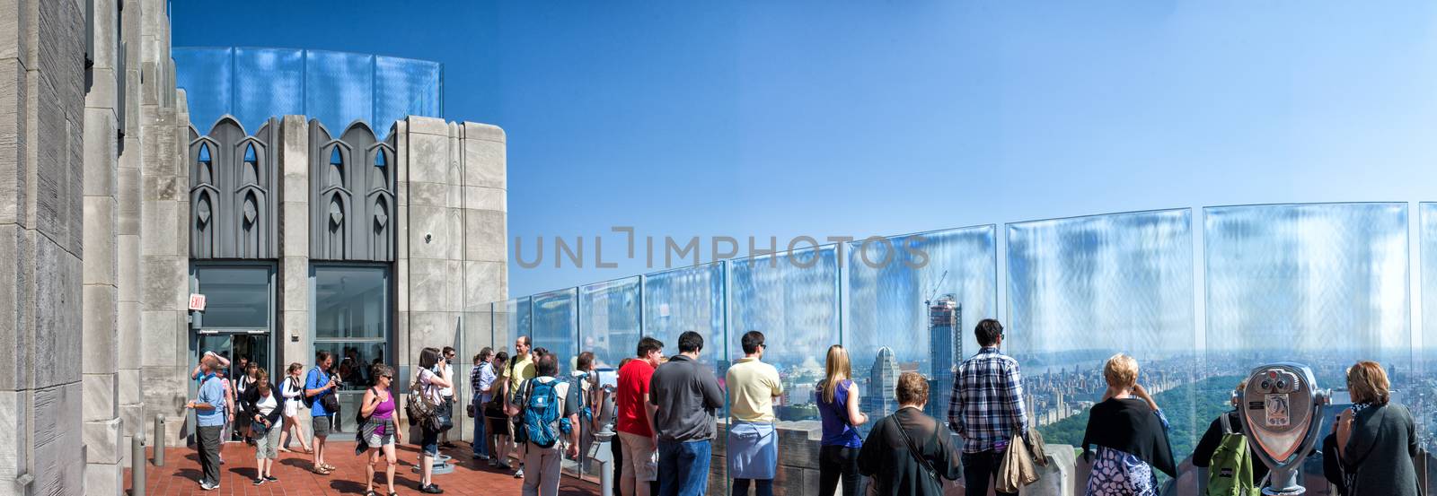 NEW YORK CITY - JUNE 13, 2013: Top of Rockfeller Center on a beautiful summer day. The building is a famous city landmark.