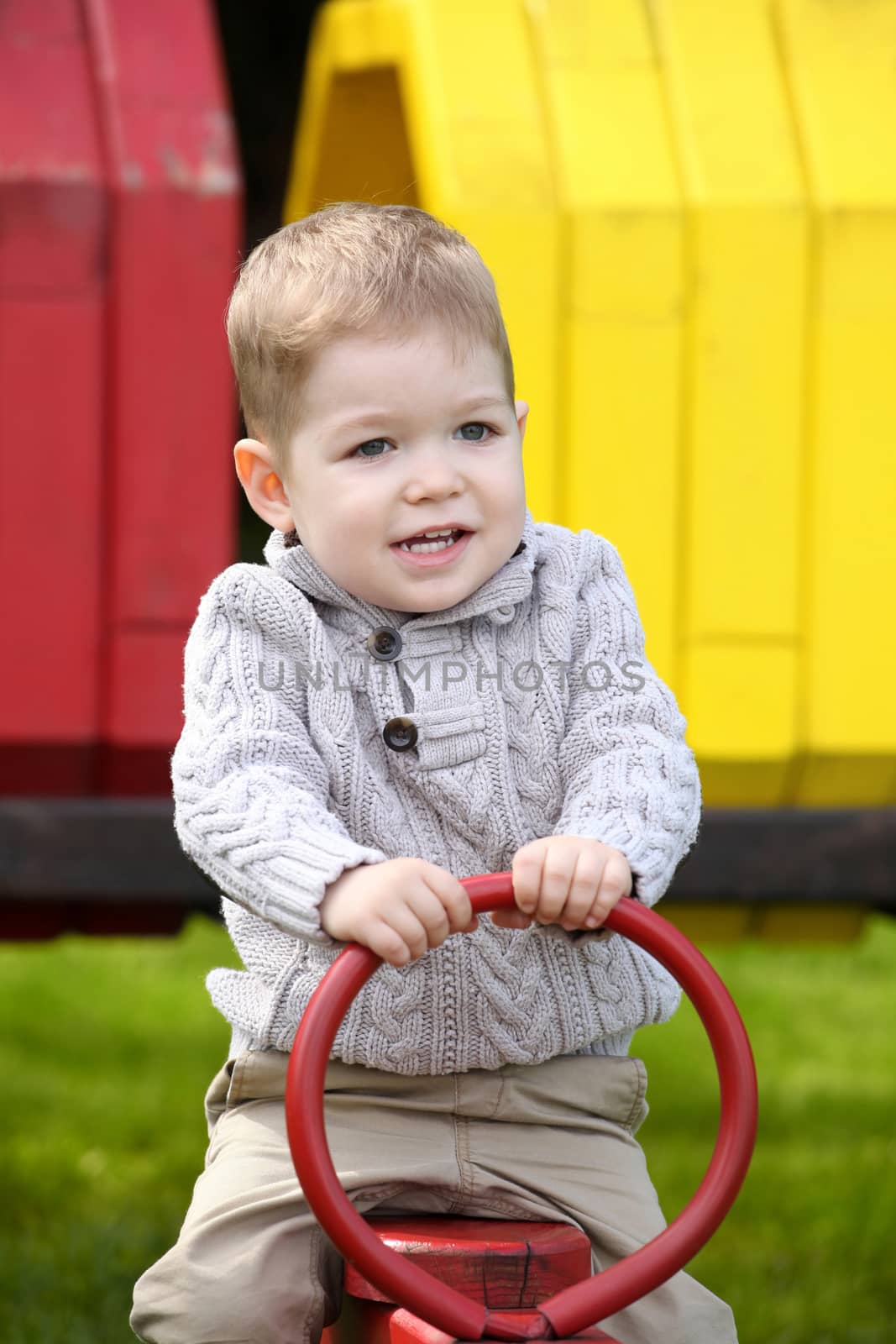 2 years old Baby boy on playground by vladacanon