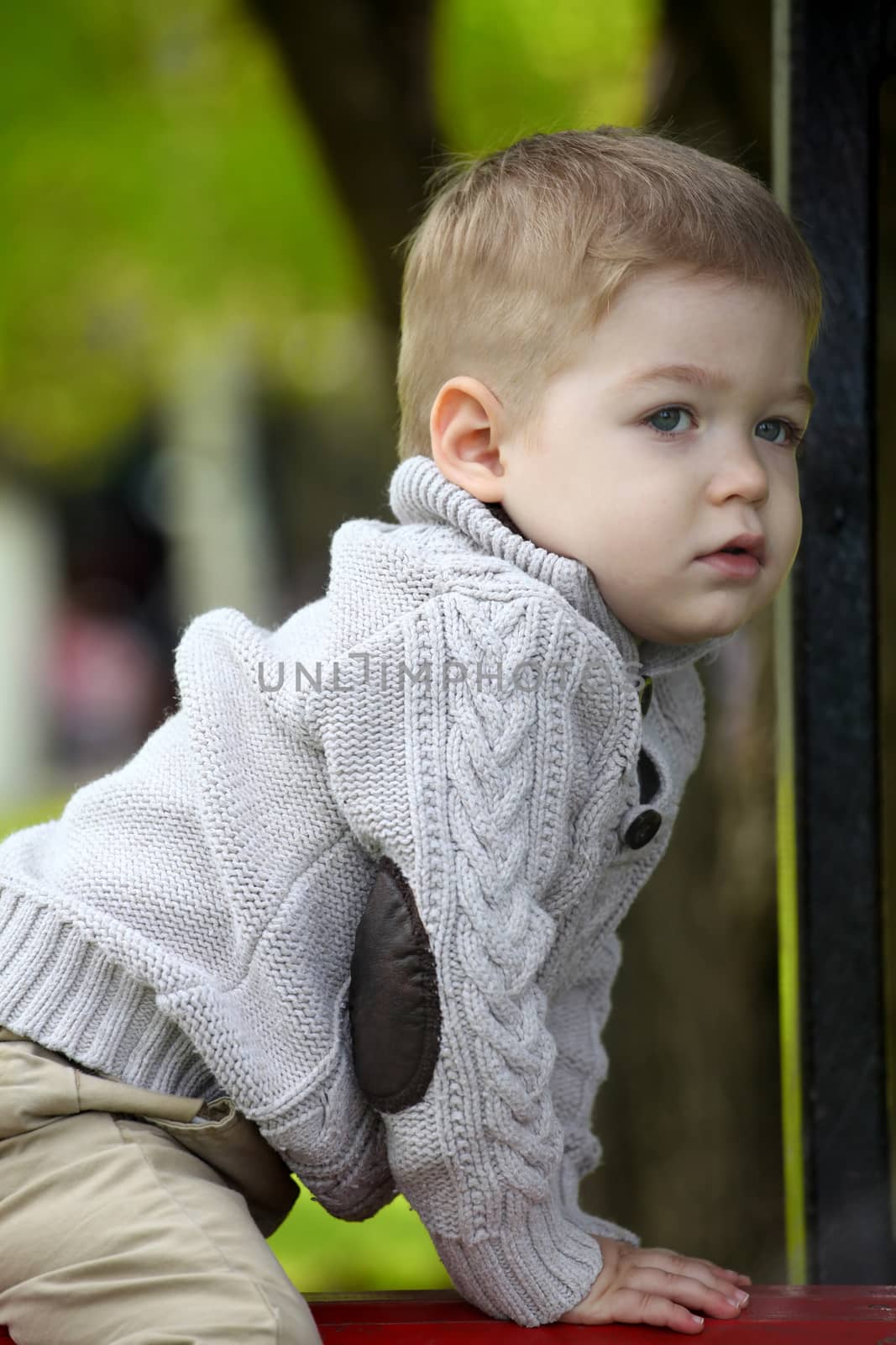 2 years old Baby boy on playground  by vladacanon