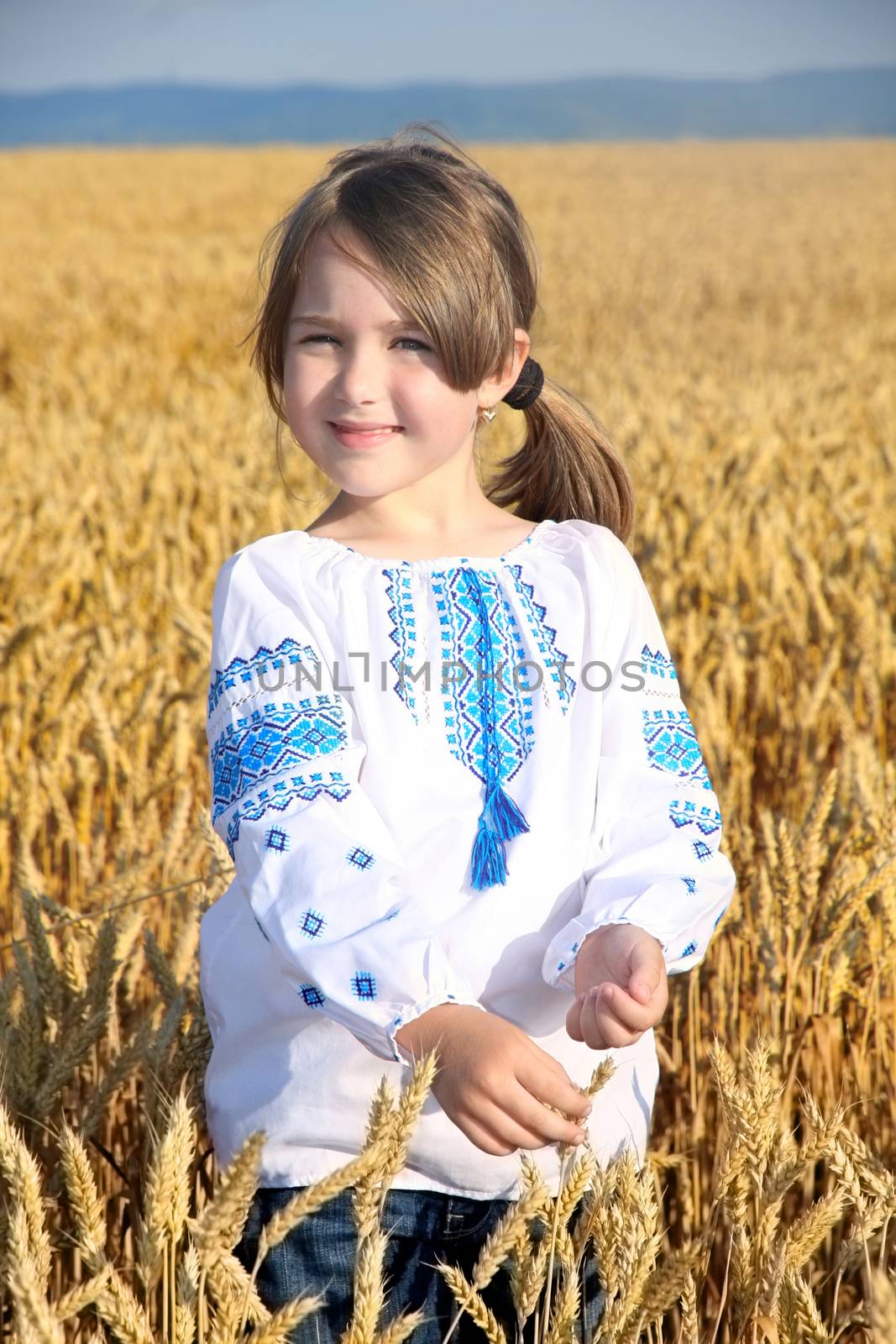 small rural girl on wheat field by vladacanon