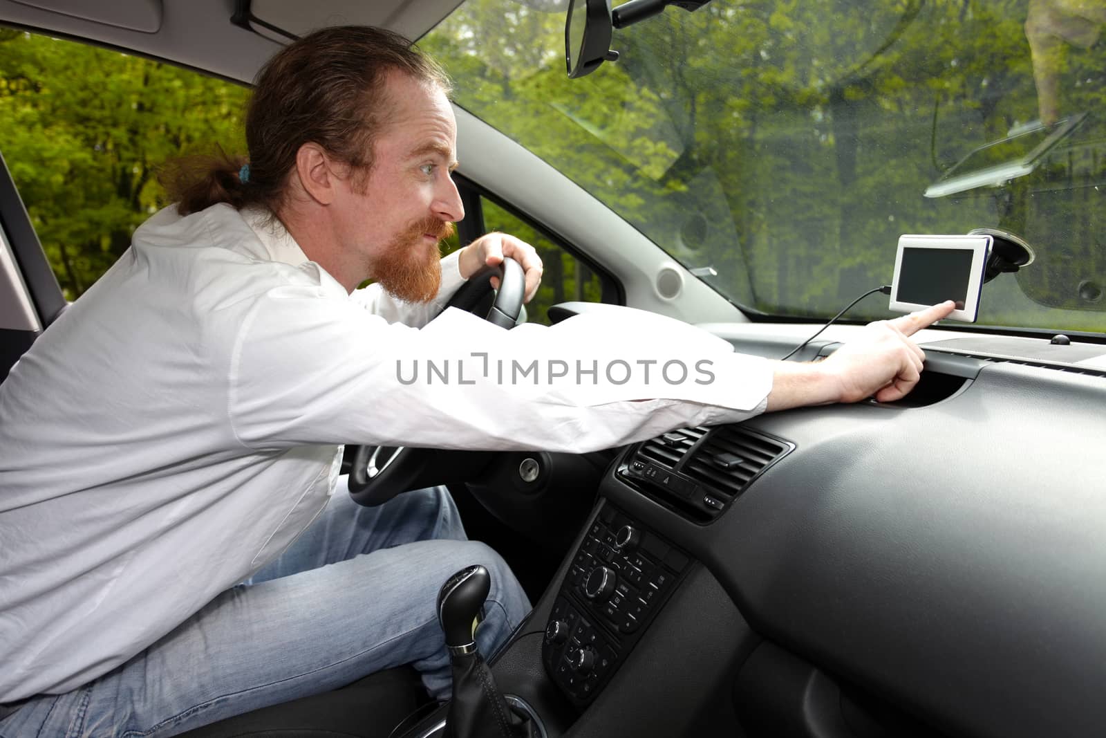 Driver using  GPS navigation a way