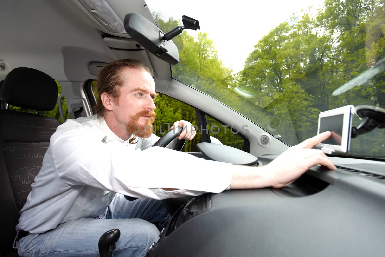 Driver using  GPS navigation a way