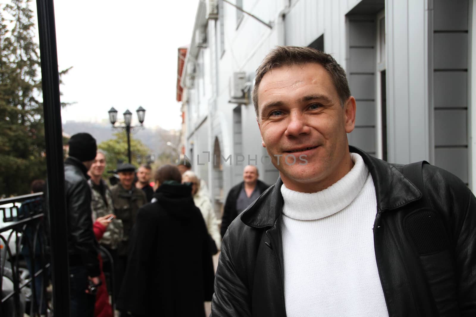 Tuapse, Krasnodar region, Russia - March 23, 2012. The ecologist Evgeny Vitishko together with other ecologists waits for release after Suren Gazaryan's arrest