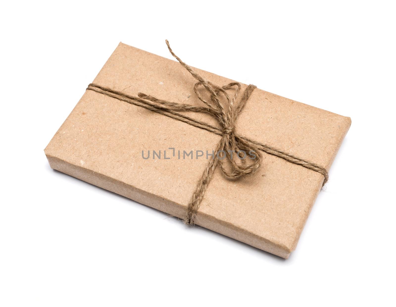 parcel wrapped with brown kraft paper isolated on white background