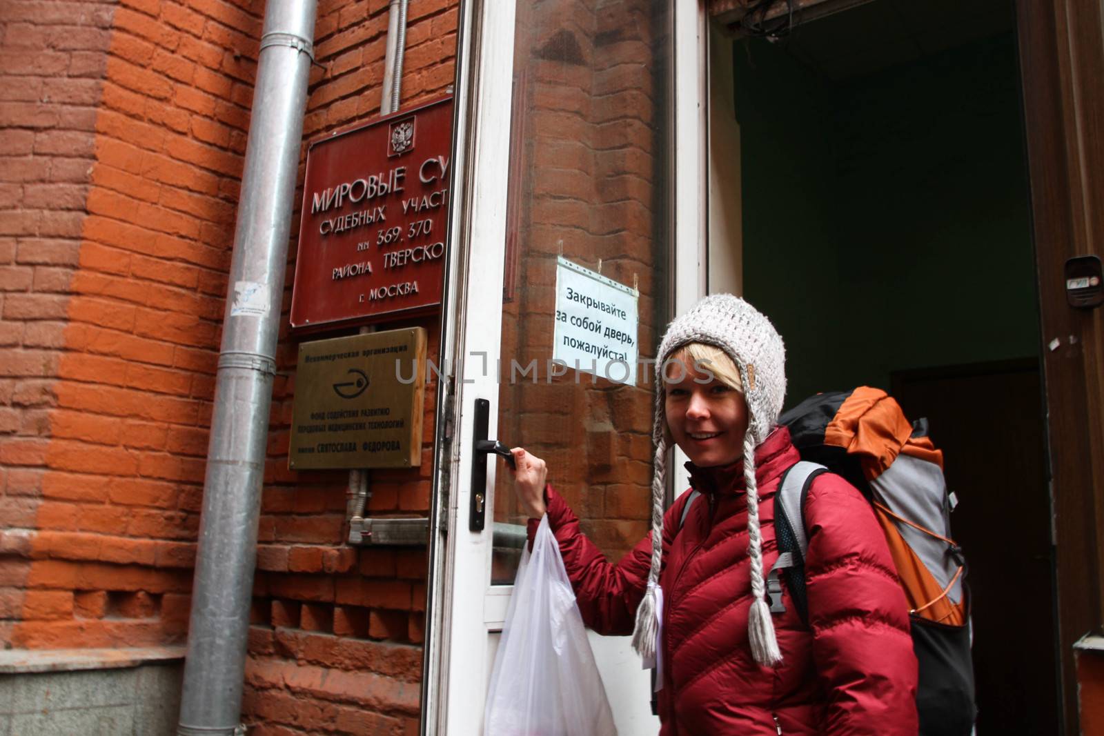 Moscow, Russia - April 10, 2012. The ecologist Evgenia Chirikova with the things prepared for arrest on an entrance to the courthouse. The politician was judged for that that it together with the politician Nikolay Lyaskin placed protest tent into Red Square