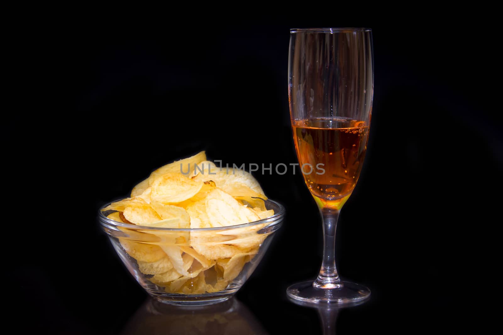 Aperitif seen in front of a black background