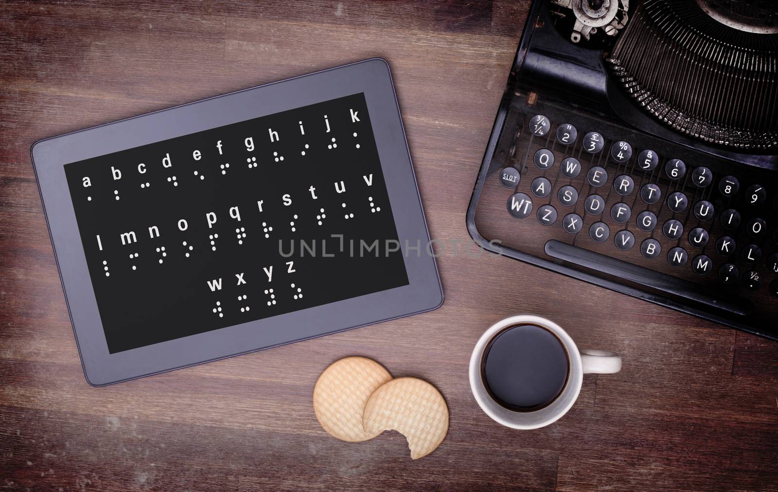 Braille on a tablet, concept of impossibility, vintage look