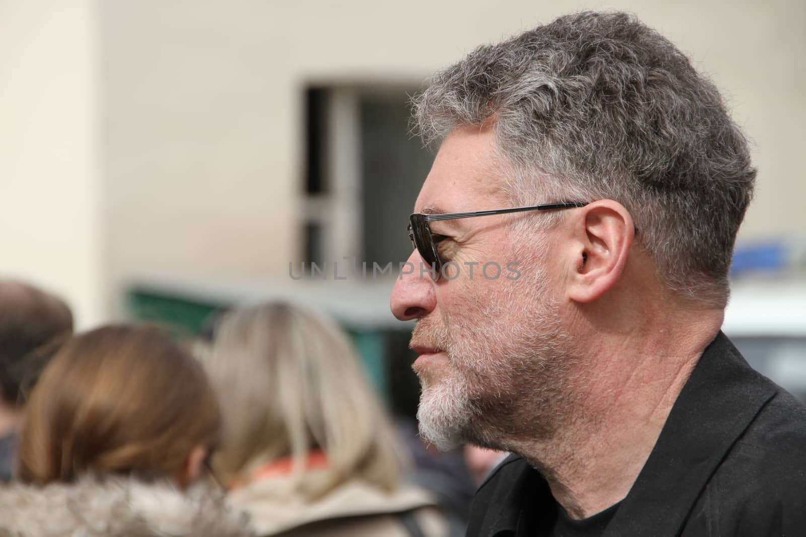 Moscow, Russia - April 19, 2012. The musical critic Artemy Troitsky came to support the arrested participants of Pussy Riot to court. Near the building of the Tagansky court to an unauthorized action there were supporters of the verdict of not guilty for arrested.