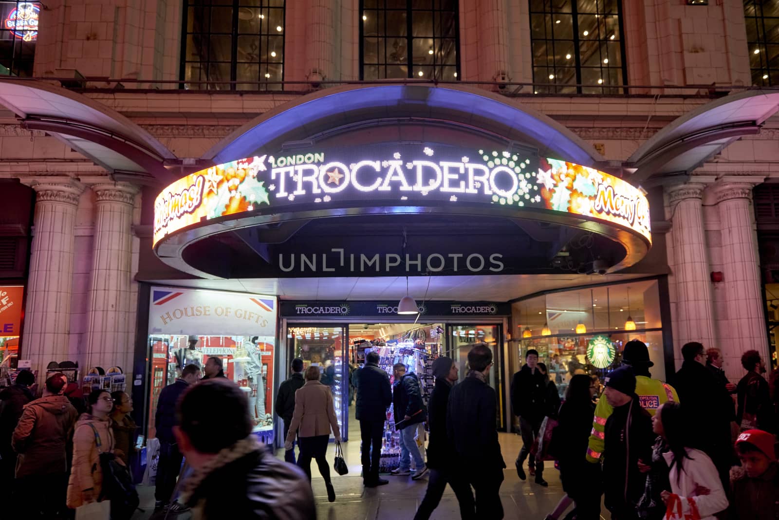 LONDON, UK - JANUARY 02: Busy street in front of entrance to London Trocadero shopping centre. January 02, 2015 in London.