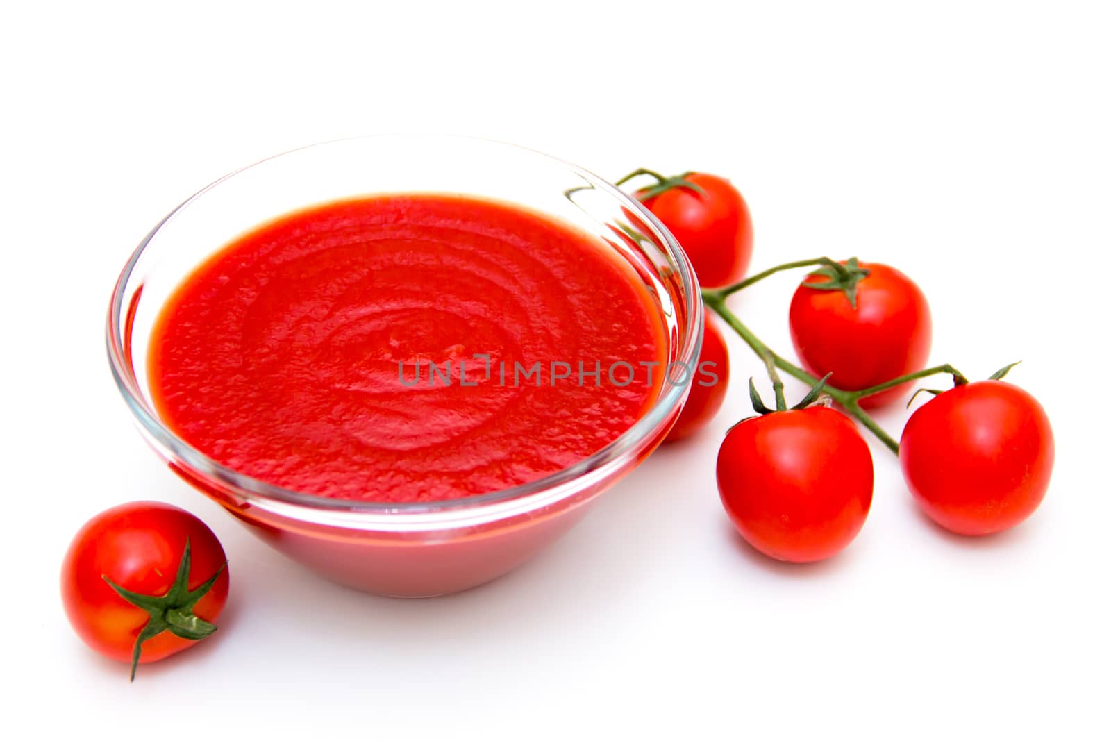 Tomato sauce on bowl on white background