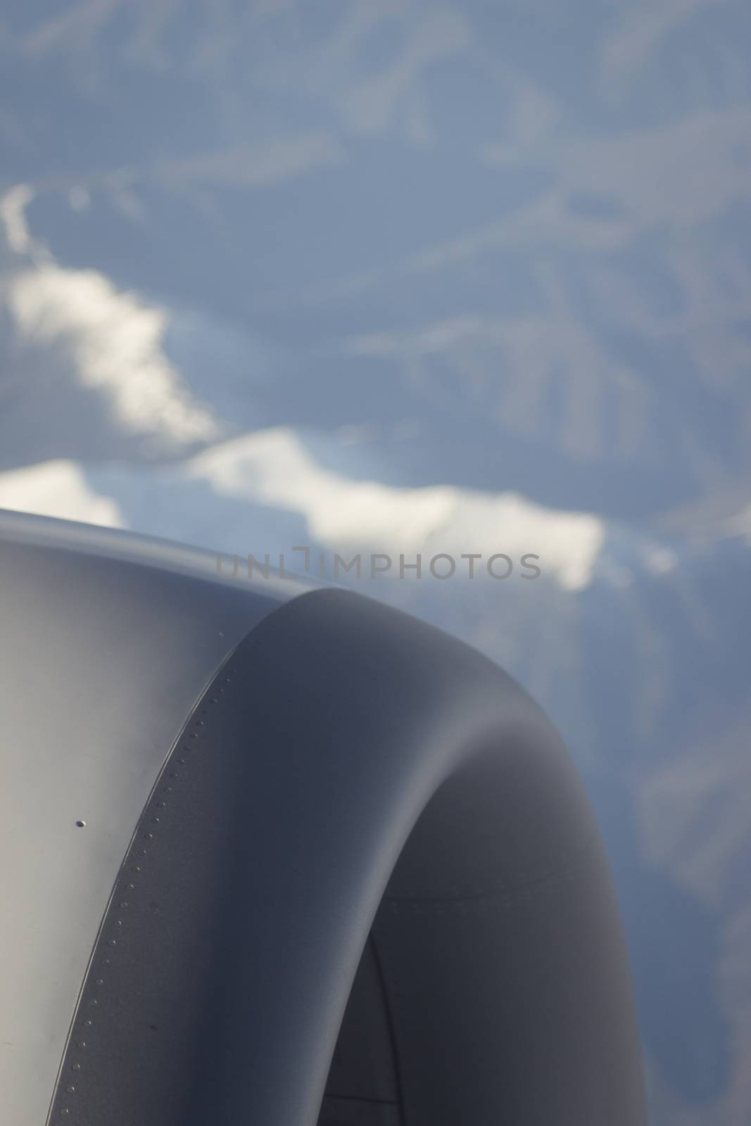 Airplane flying in sky engine wing by edwardolive