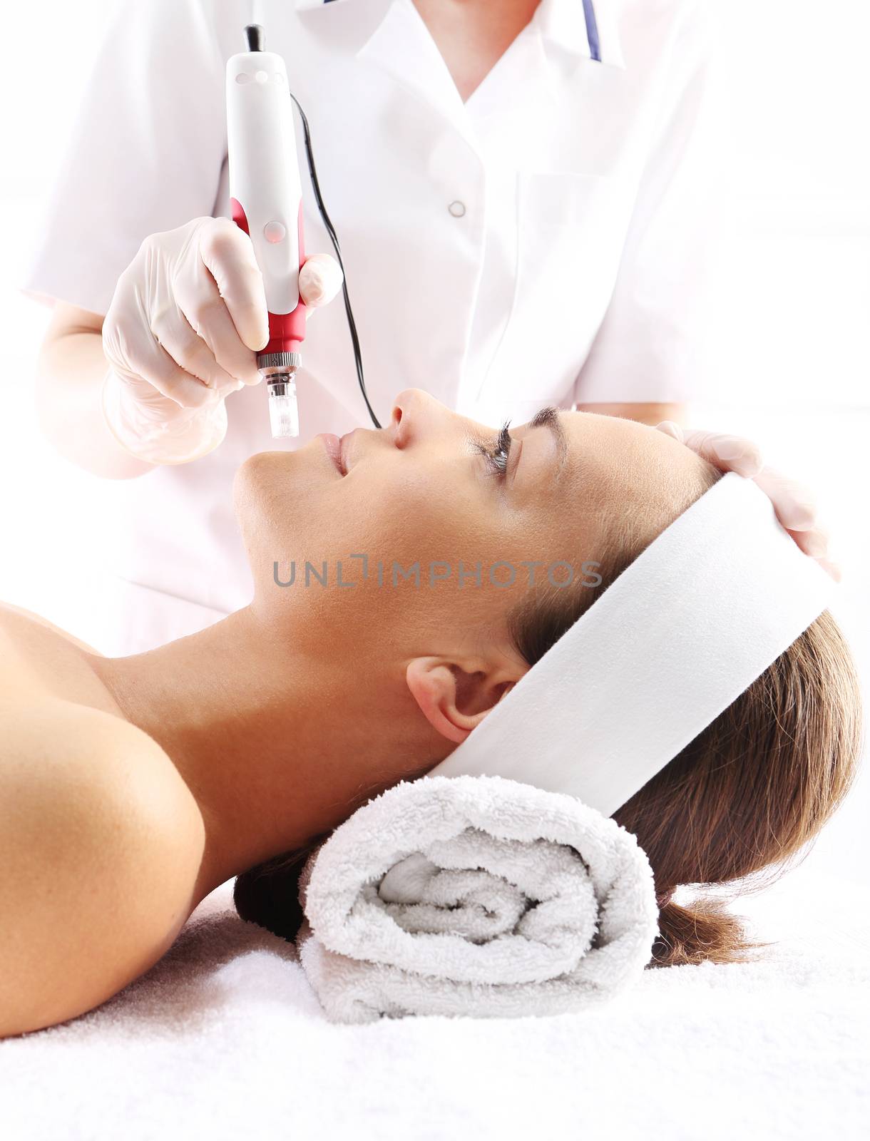 Rejuvenation, beautification, the woman at the beautician, Mesotherapy microneedle by robert_przybysz