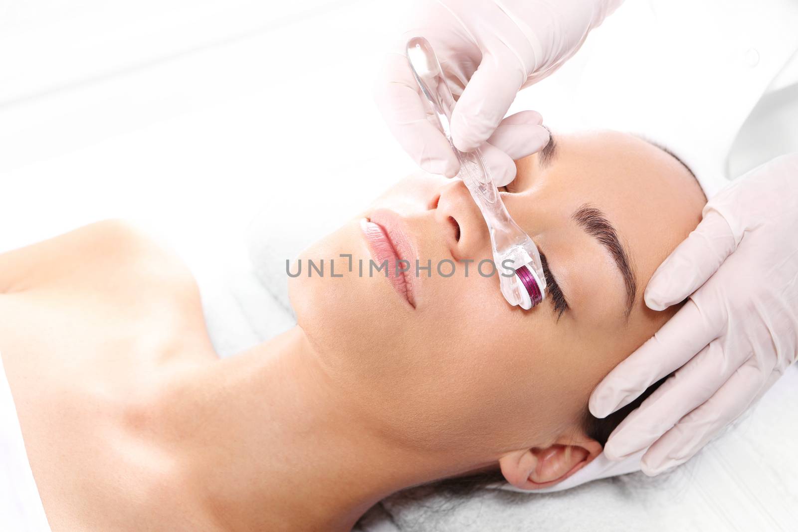 Rejuvenation, beautification, the woman at the beautician, Mesotherapy microneedle by robert_przybysz