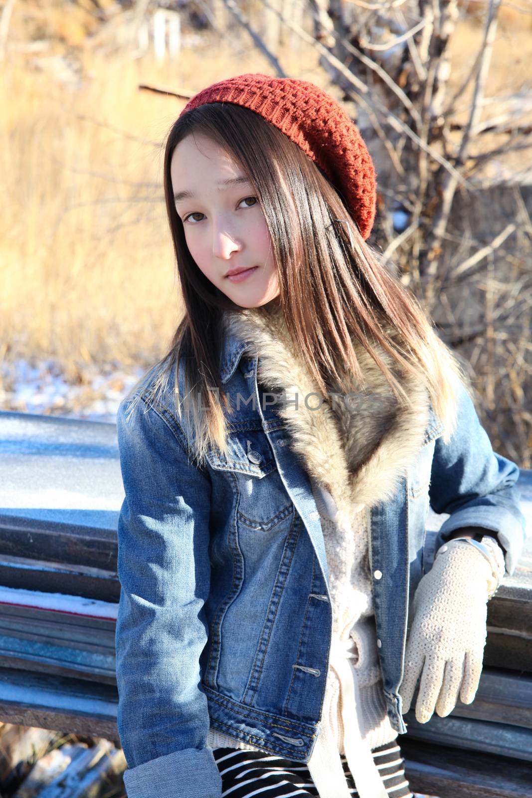 Teen girl outside on a cold winters day