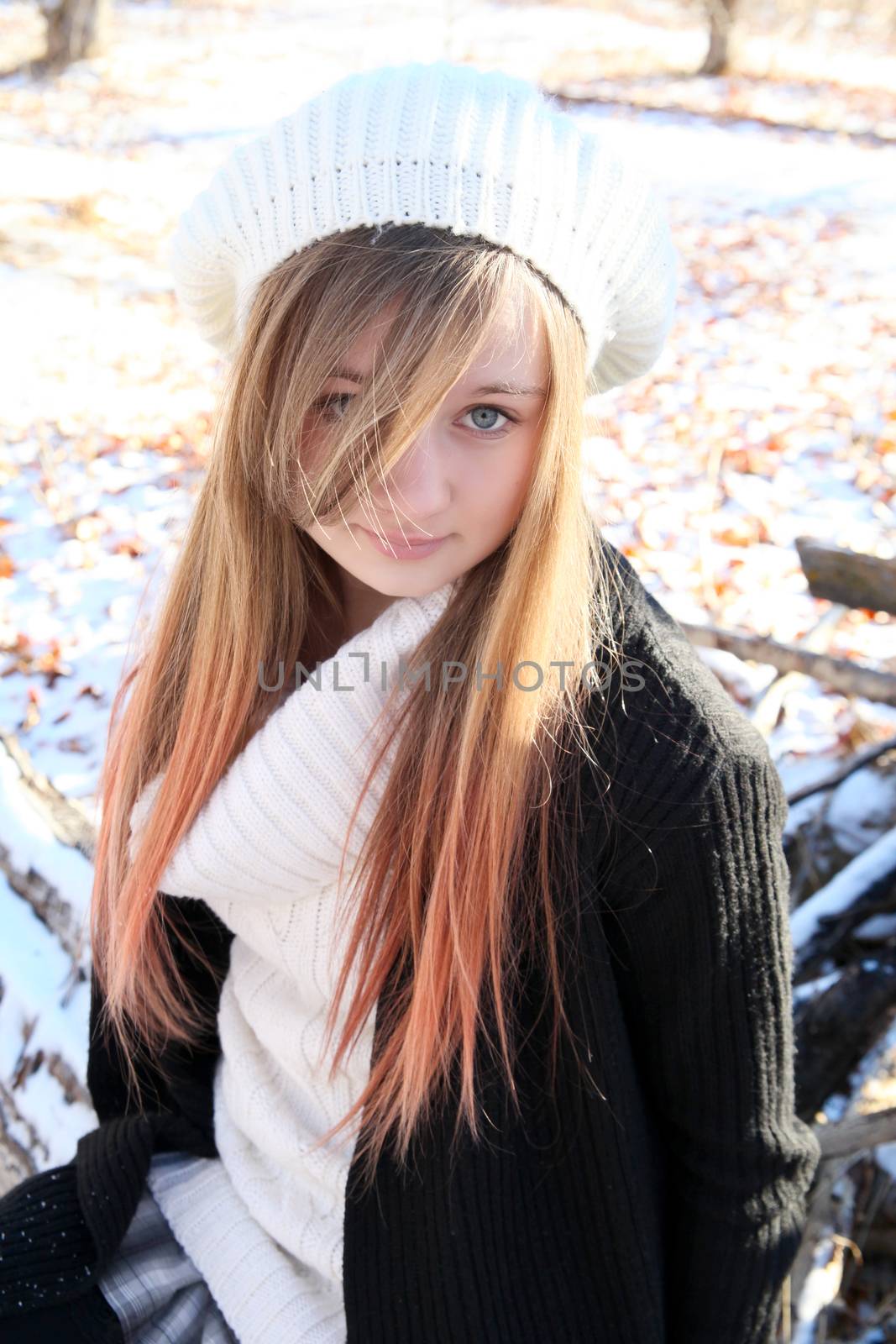 Teen girl outside on a cold winters day
