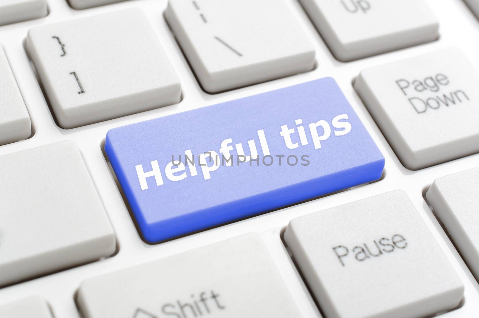 Blue helpful tips key on keyboard