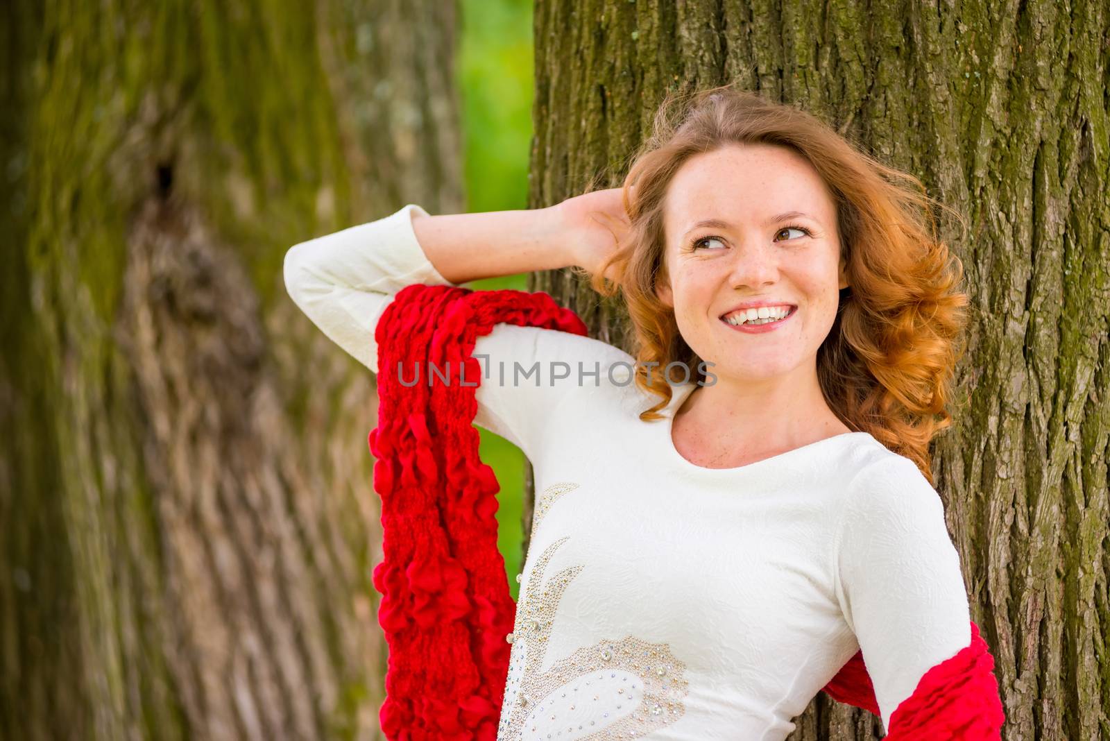 red-haired girl with curly hair beautiful smiles