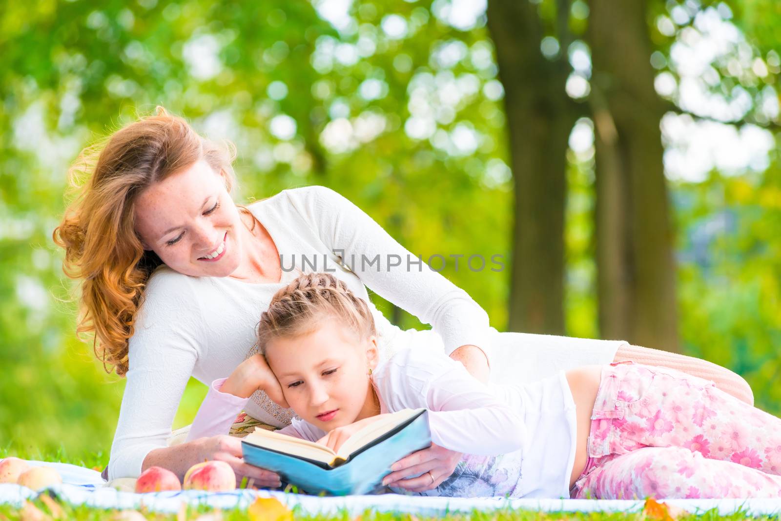 beautiful ladies on a sunny day in the park on a picnic