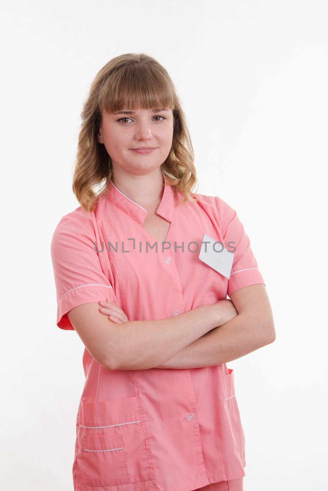 Portrait of a pretty girl medical worker on a white background