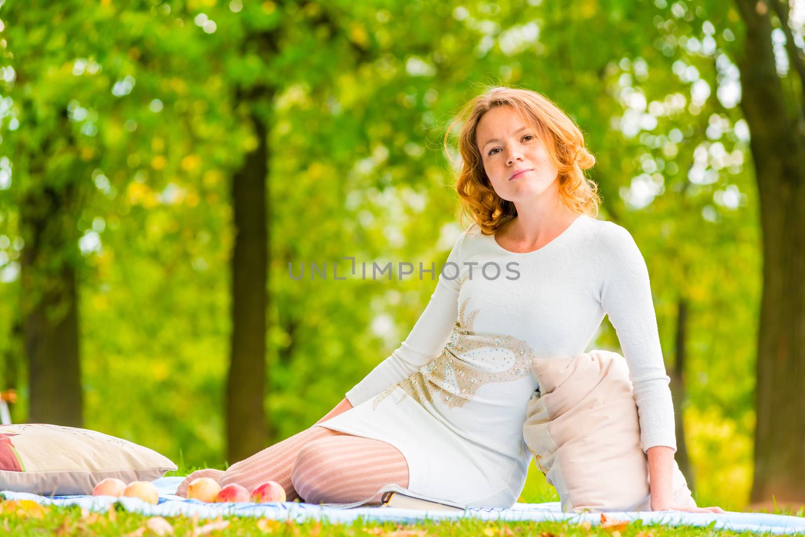 romantic girl on a picnic in the park
